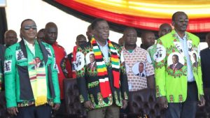 President Mnangagwa (centre) was campaigning ahead of elections next month 